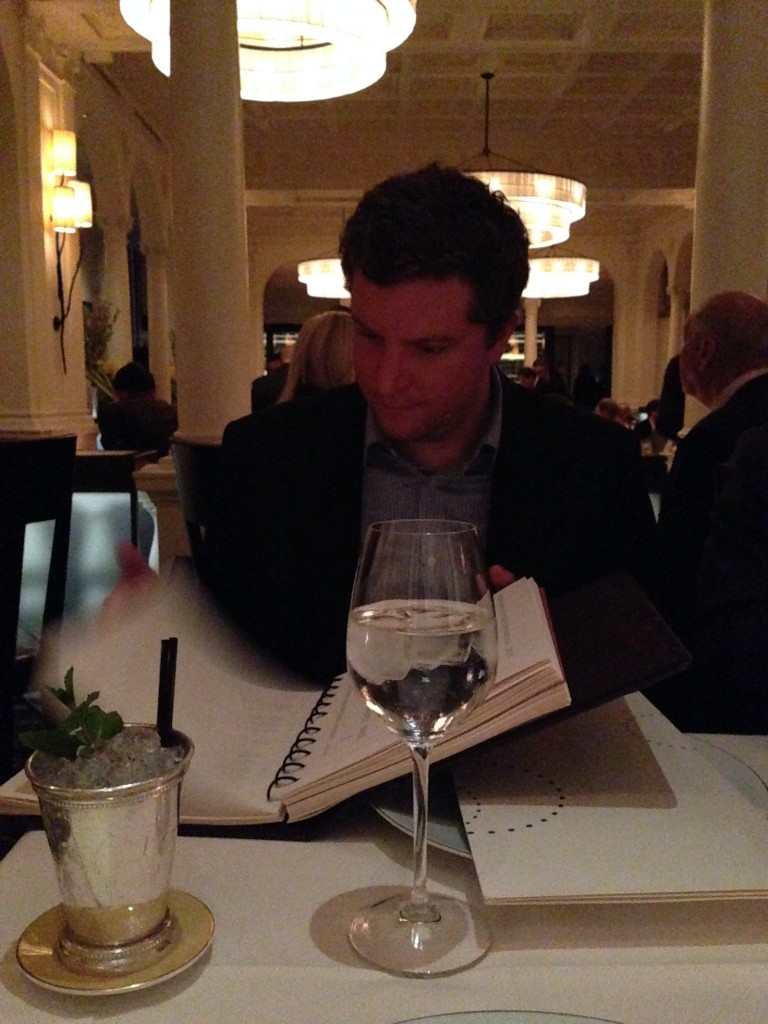 Steve choosing wine at Daniel
